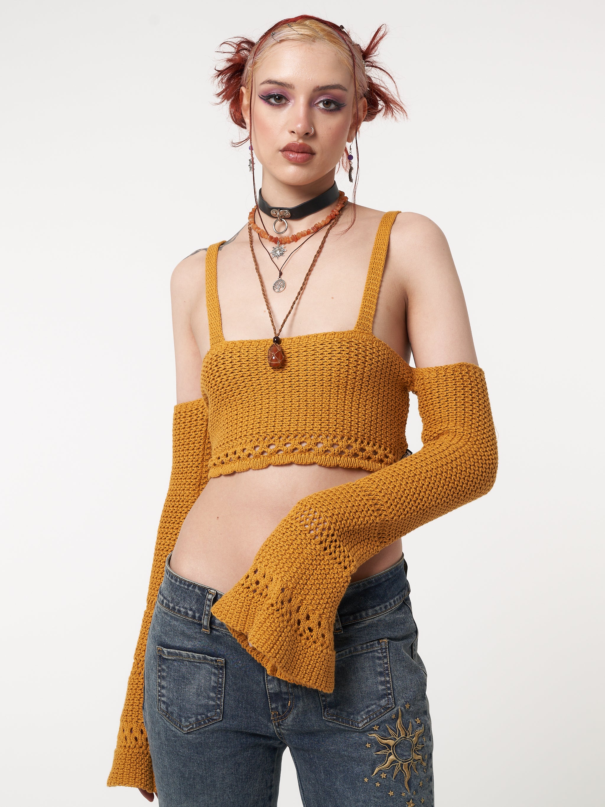 Knitted crop top in golden yellow with flared long sleeves