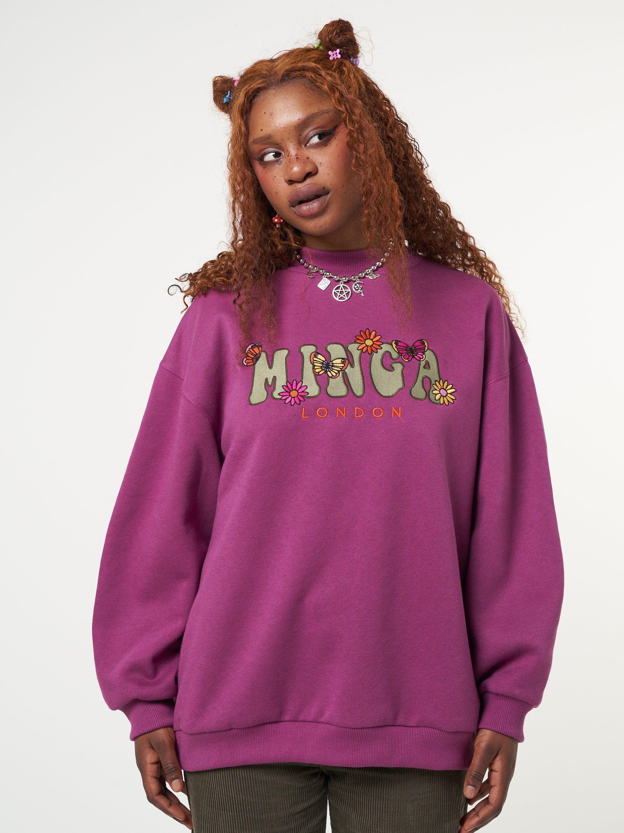Oversized fit sweater in purple orchid with Minga London flowers and butterflies front embroidery