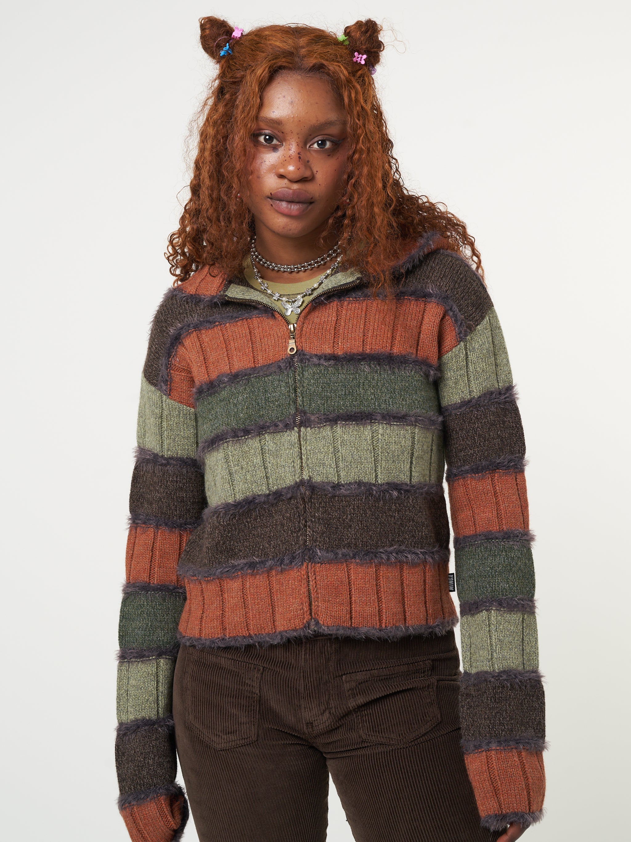 Zip up hood knitted cardigan with orange, green and brown patchwork stripes