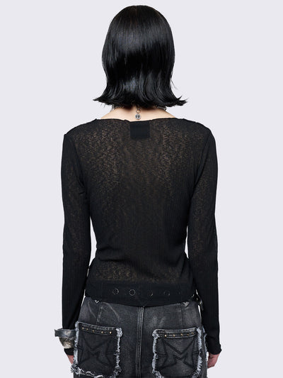 Asymmetric top in black with lace up and cut out detail. Grunge vibe. 