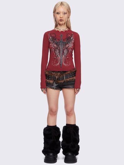 Black faux fur flared leg warmers with pom pom drawstring.