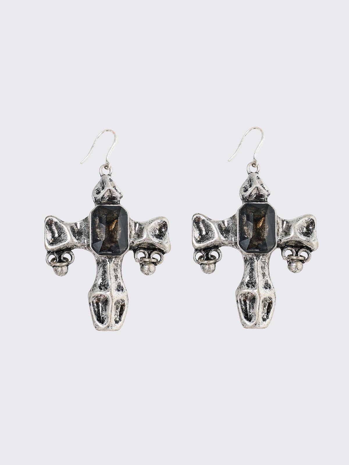 Pair of silver cross-shaped earrings with embedded stones 