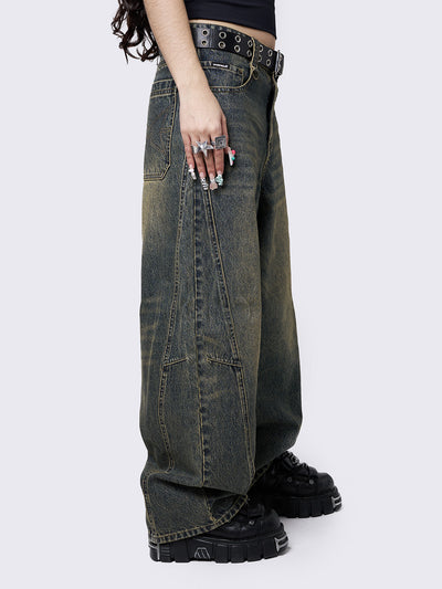 Blue washed super baggy jeans with green overdye, a relaxed fit, regular waist, zip fly, button fastening, and belt loops. Trendy streetwear style.