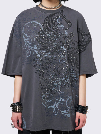 Grey washed t-shirt with grunge graphic front print featuring studded details. 