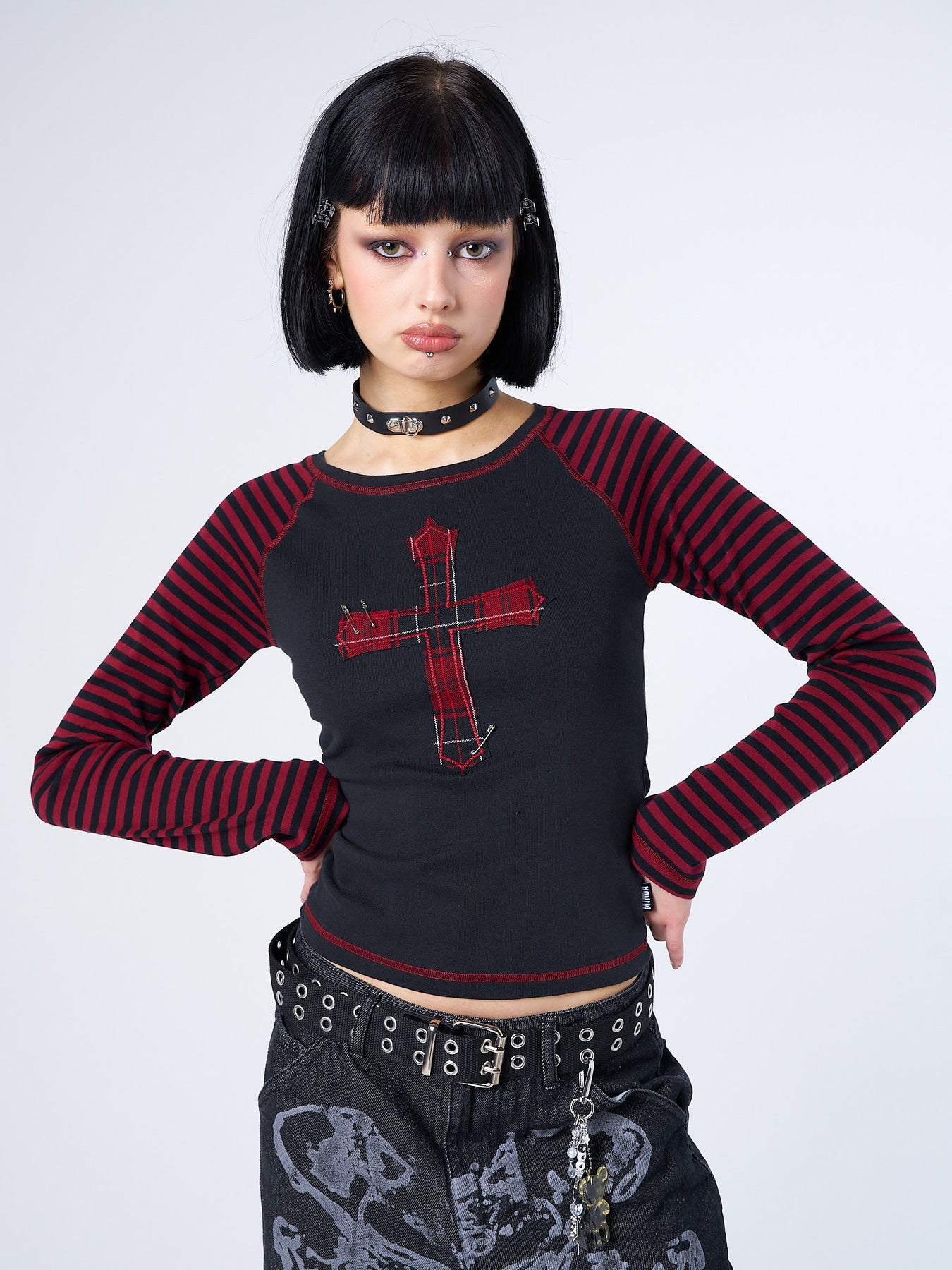 Black Raglan Long Sleeve Top with Red Striped Sleeves & Plaid Cross ...