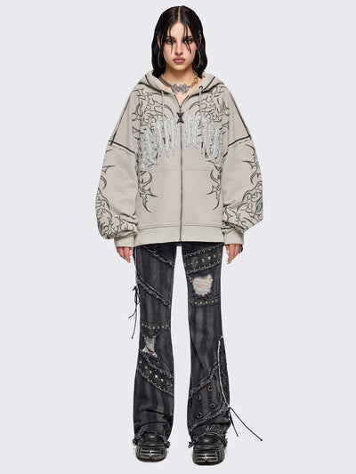 Bone beige zip up hoodie jacket featuring a black tribal sigilism graphic front and sleeves print, "Minga" embroidered patch and black contrast stitching.