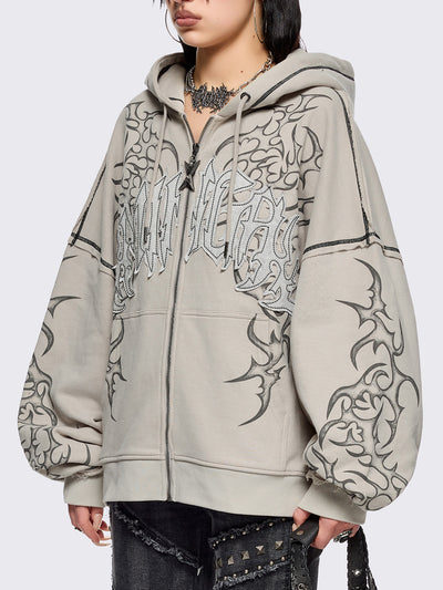 Bone beige zip up hoodie jacket featuring a black tribal sigilism graphic front and sleeves print, "Minga" embroidered patch and black contrast stitching.