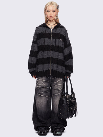 Hooded chunky knit cardigan in black and grey stripes with distressed details.