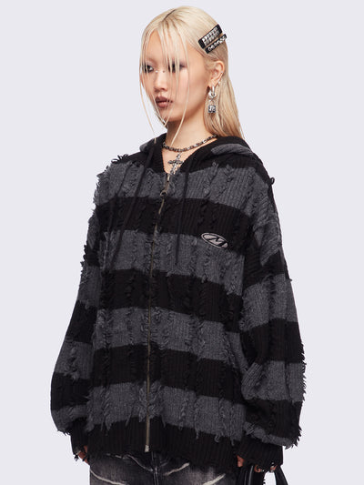 Hooded chunky knit cardigan in black and grey stripes with distressed details.