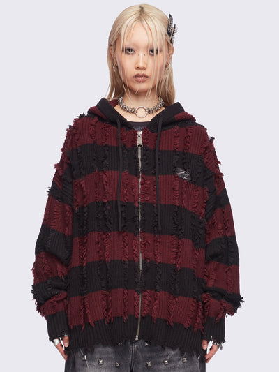 Hooded chunky knit cardigan in black and red stripes with distressed details.