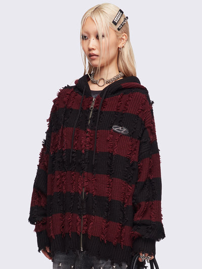 Hooded chunky knit cardigan in black and red stripes with distressed details.