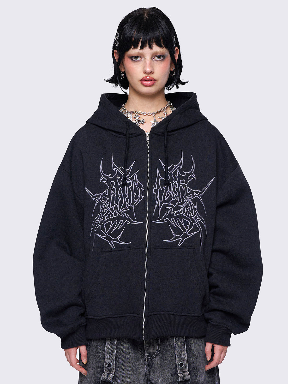 Zip up hoodie jacket in black with Sigilism graphic front embroidery and Drawstring hood.