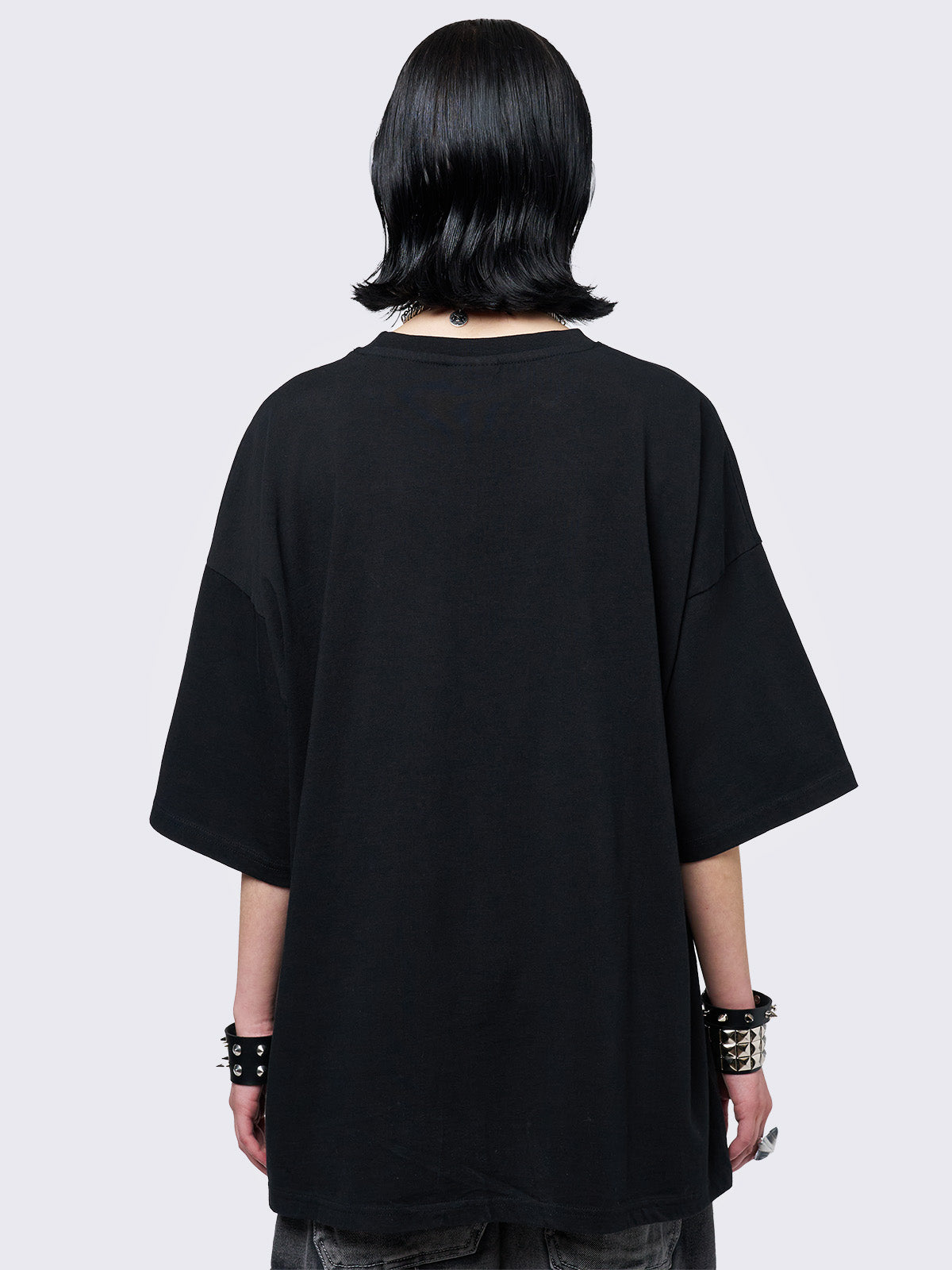 Black graphic t-shirt with grunge graphic front print. 
