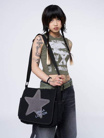 Grunge-inspired Y2K canvas messenger bag in washed black with Minga star front print in grey.