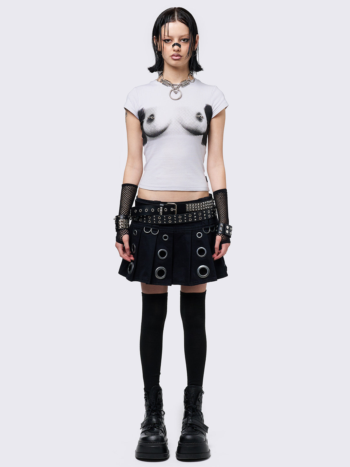 Off-white graphic baby tee with boobs print and nipple piercing details.