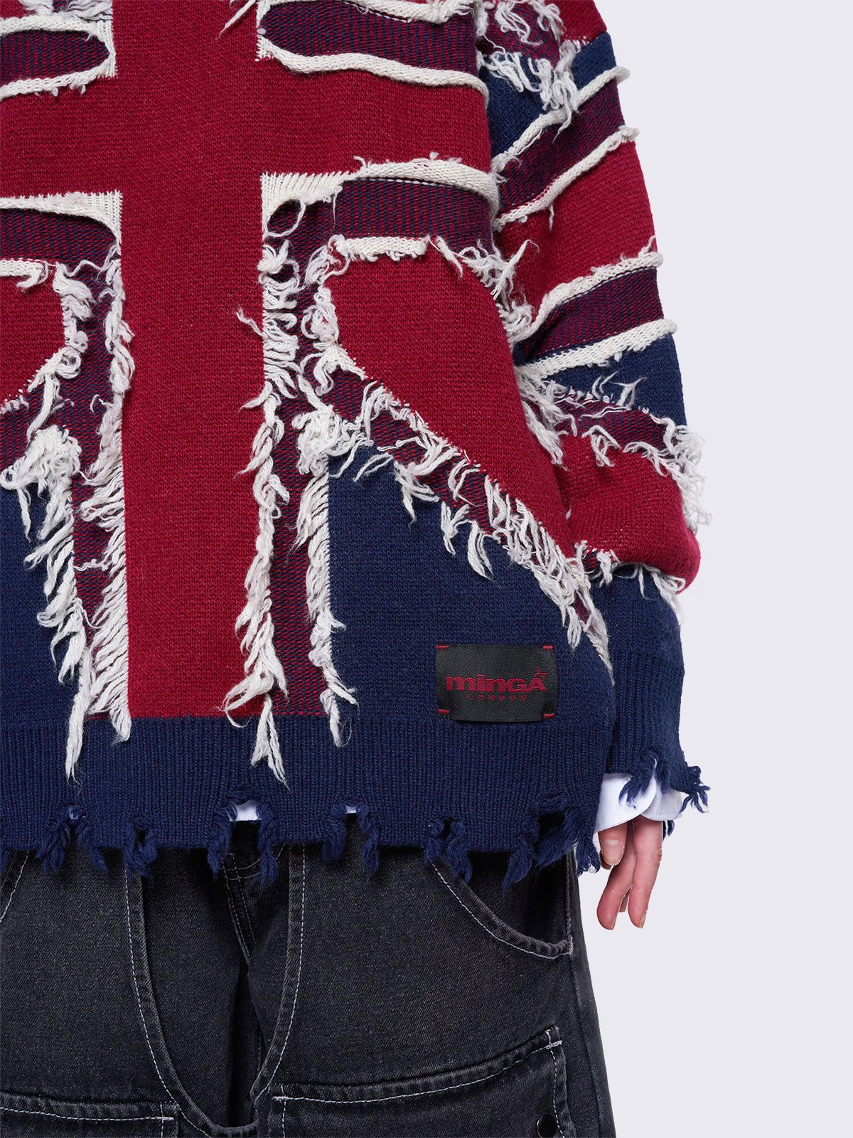 Knitted jumper with frayed uk flag and distressed details