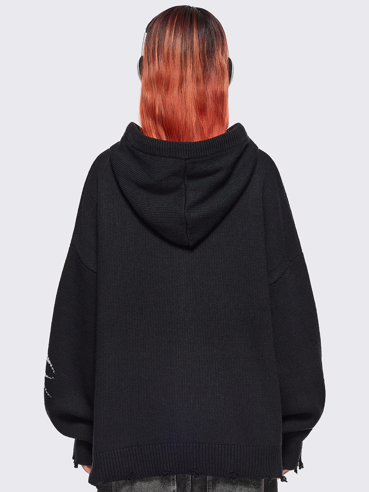 Black hooded chunky knit cardigan featuring white sigilism graphic design, contrast grey lace up details and distressed trims.