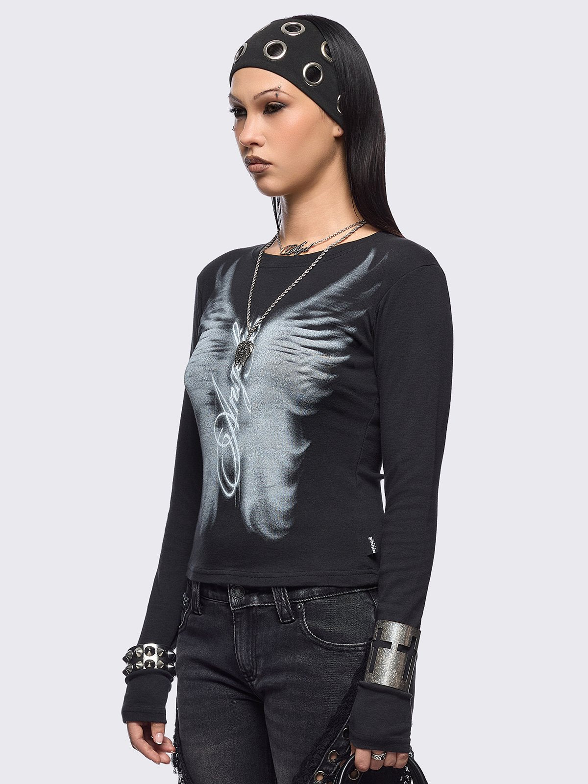 Black long sleeve top featuring an angelic wings graphic front print.