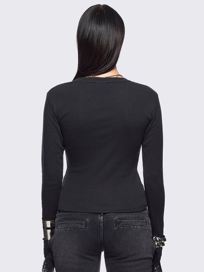 Black long sleeve top featuring an angelic wings graphic front print.