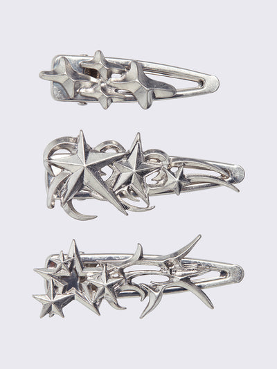 Silver hair clip 3 pieces set with stars design. 
