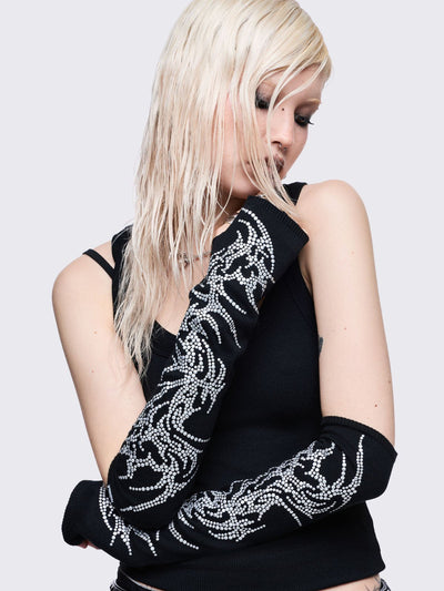 Black knitted arm warmers with sigilism design with hot fix studs.