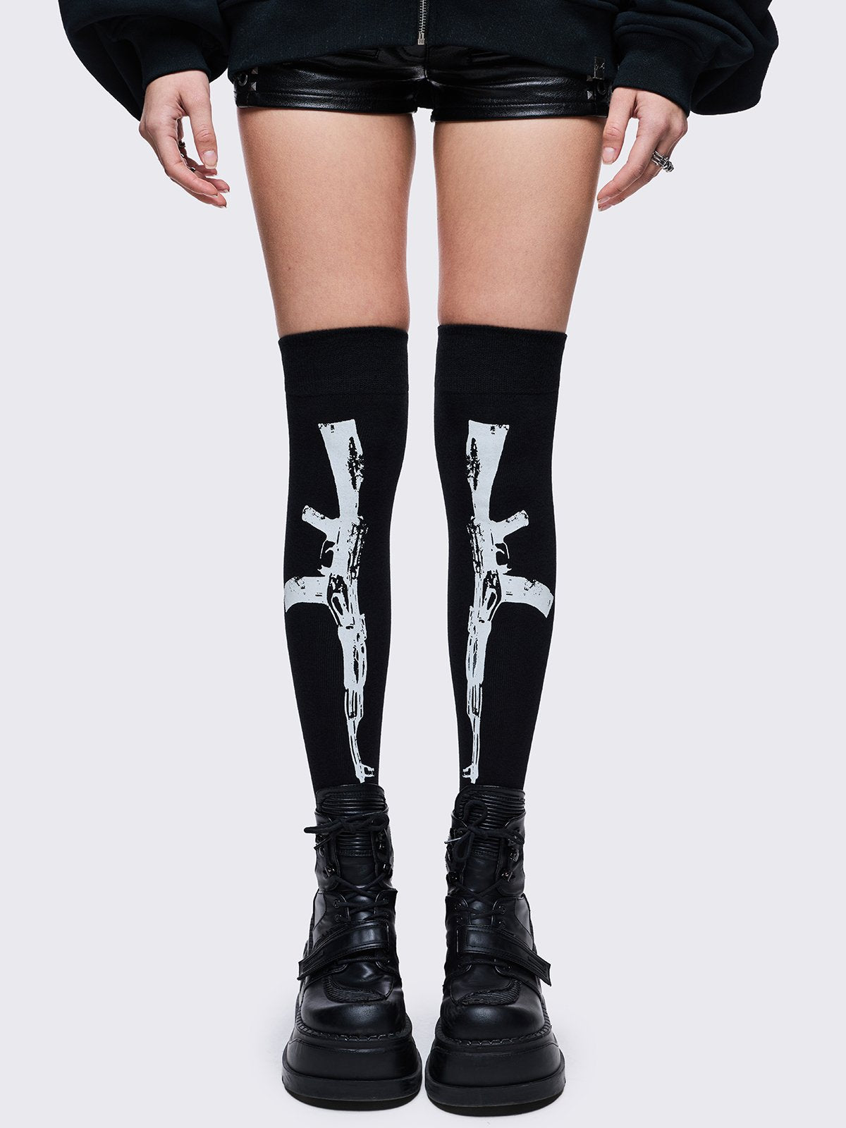 Black opaque thigh highs socks with white graphic design 