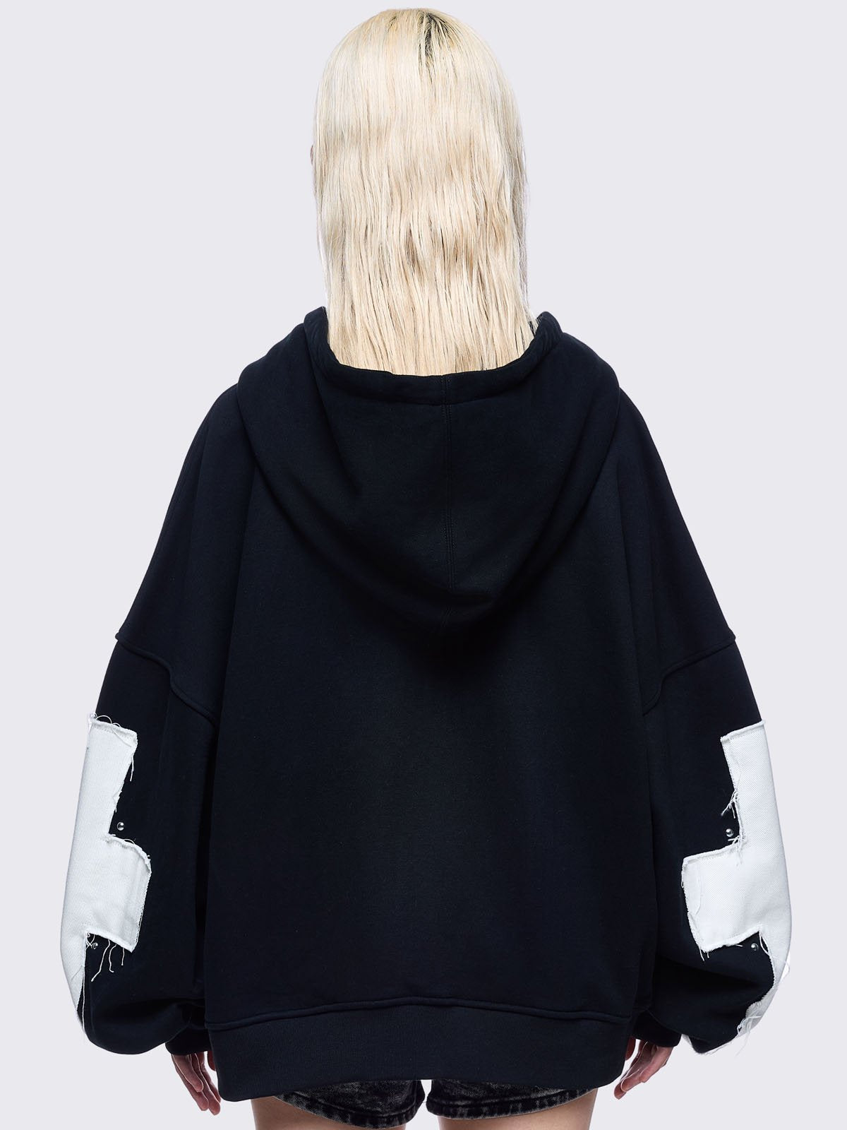Black zip up hoodie jacket with white chunky cross patches. on front and sleeves