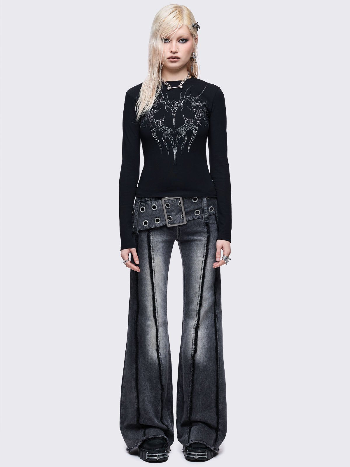 Black long sleeve top with sigilism heart rhinestone design.