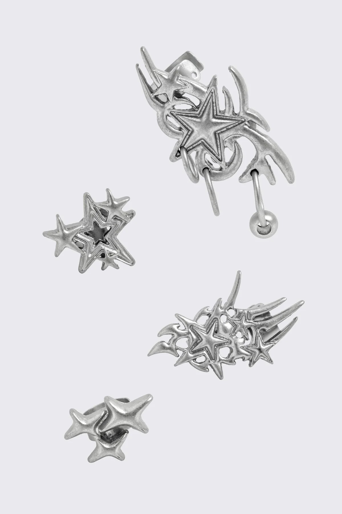 Silver chunky earring set with ear cuffs. All stars design. 