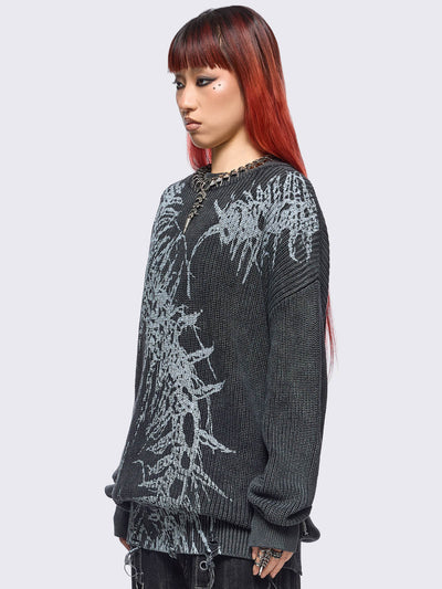 Black washed knit jumper in chunky ribbed knit with centipede graphic front print and distressed hem details. 