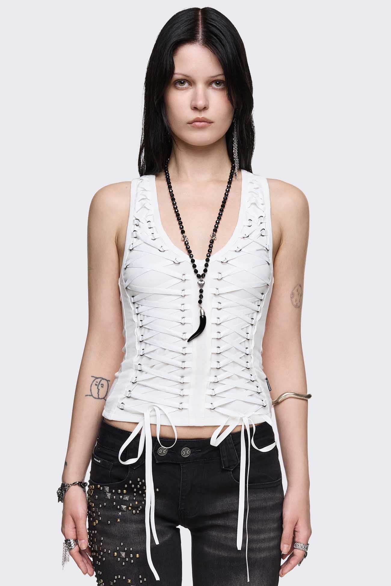 White cotton tank top with corset lace-up D-ring detail, V-neck and slim fit in a grunge-inspired style.