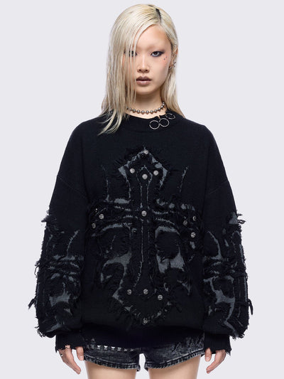 Black knitted jumper featuring frayed crosses design and stud and O-ring details.
