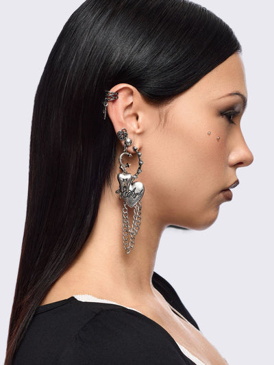 Silver 4pc layering earring set featuring heart and tooth pendant in chunky hoops, studs and ear cuff style.