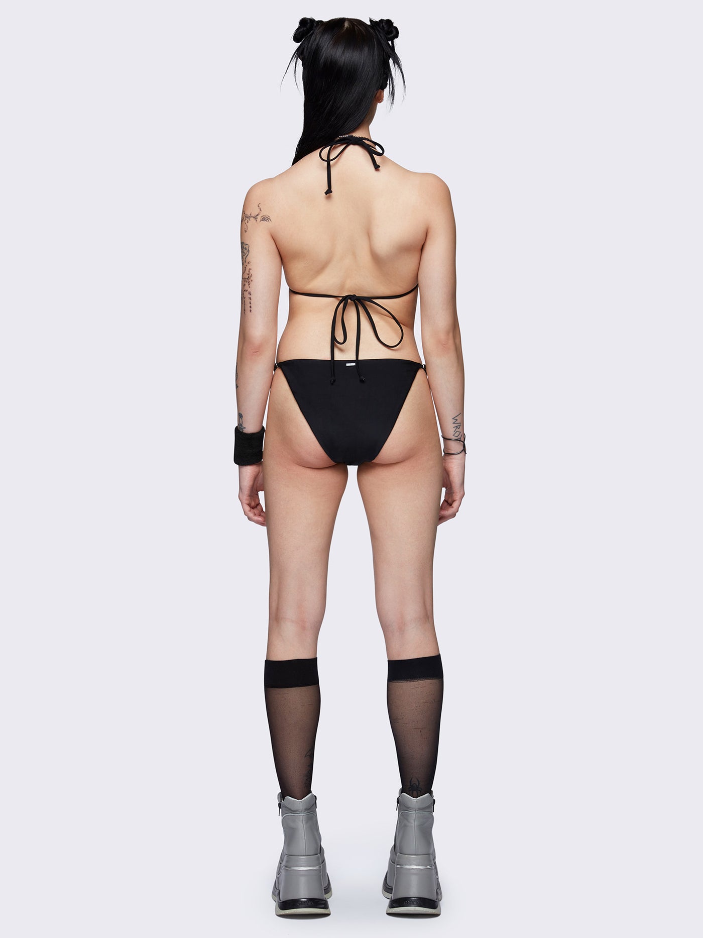 Slim straps bikini bottoms in black with metal details 