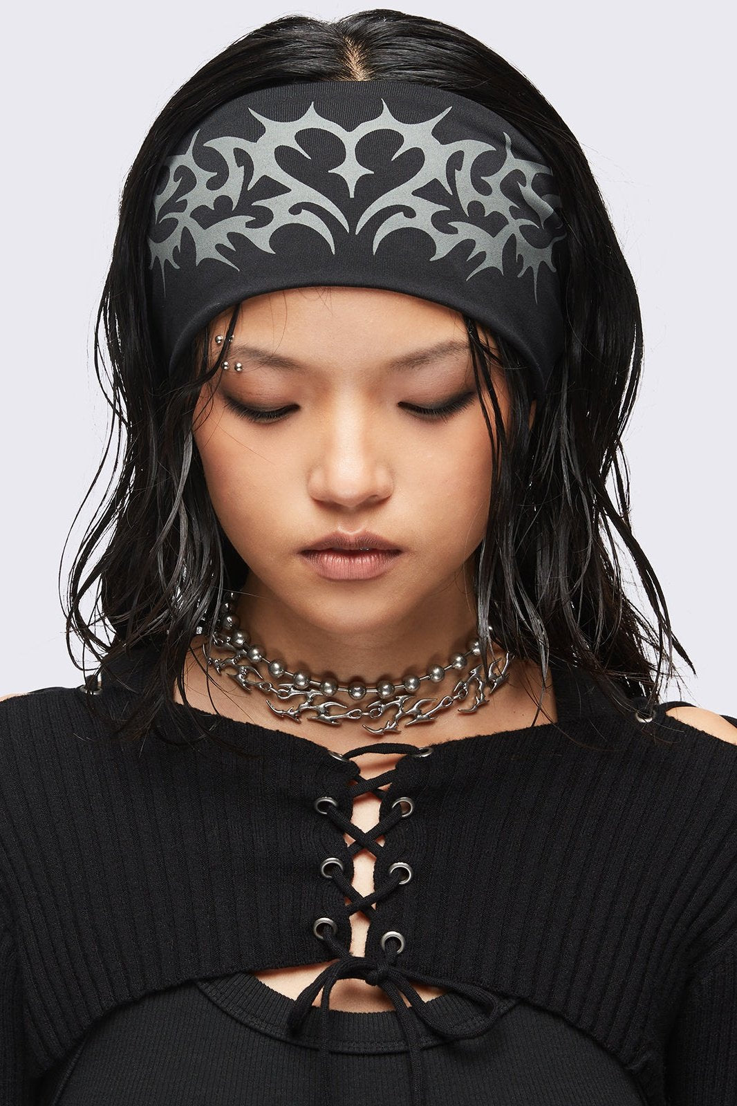 Black headband with cyber sigilism heart tattoo print.