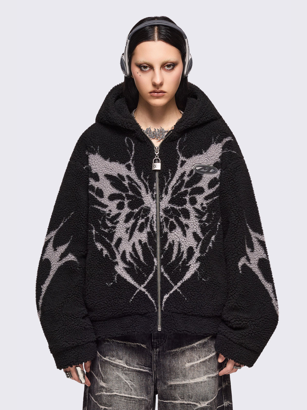 Black fleece hoodie jacket featuring grey dark butterfly sigil design.
