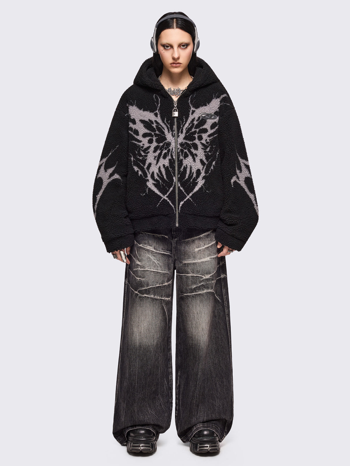 Black fleece hoodie jacket featuring grey dark butterfly sigil design.