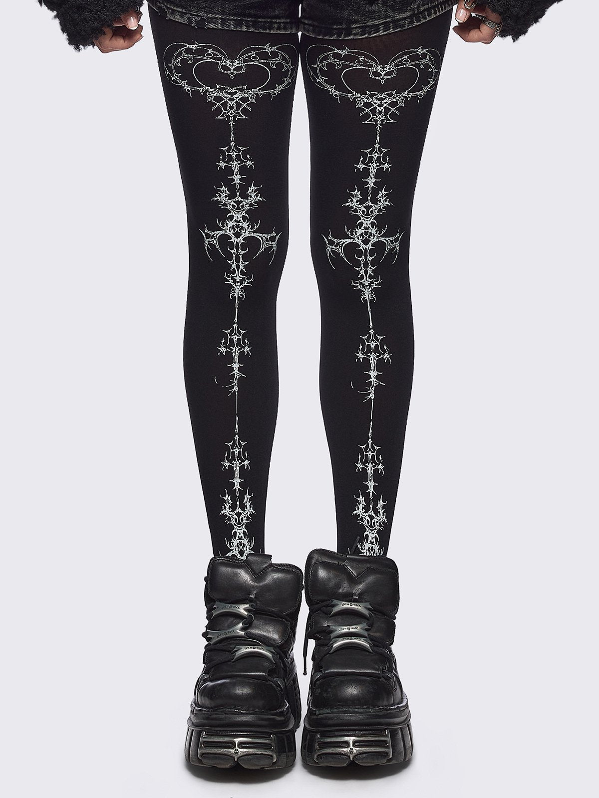 Black opaque tights with white sigilism print.