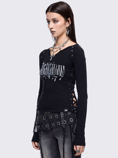 Black long sleeve top with "delirium" graphic front print, lace-up sides and silver eyelet details. 