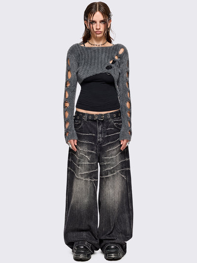 Grey fuzzy knitted sweater with cut-outs with metal ring hardware details.
Bolero asymmetric style.