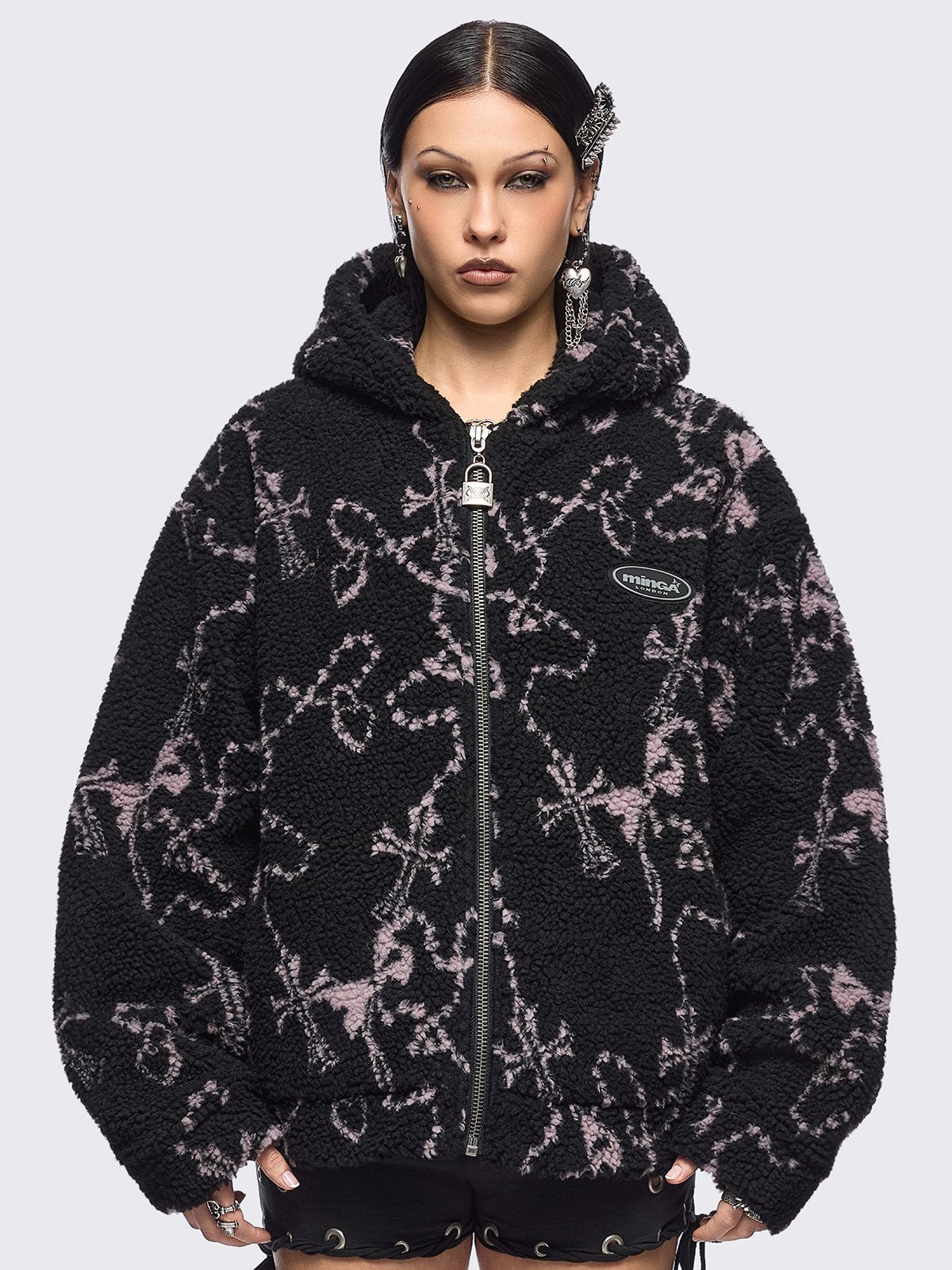 Black fleece borg hoodie jacket featuring all over pink rosary designs.