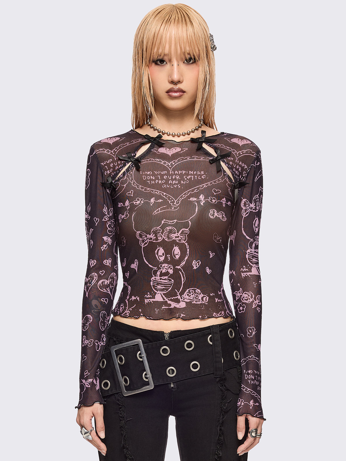 Black mesh top with all over pink graphic print by Esther Bunny artist and cut out details with bows.