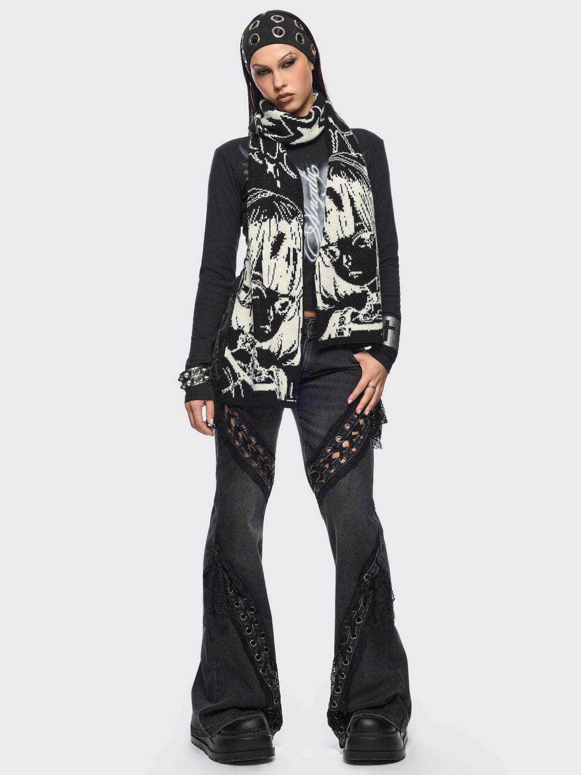 Black knitted scarf featuring a white cyber anime girl jacquard.