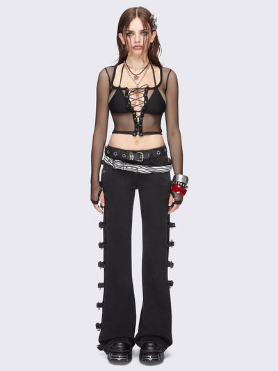 Black flared jeans with buckle details on side and low waist.