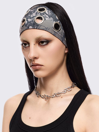 Forest tree camo print headband with eyelets metallic hole details.
