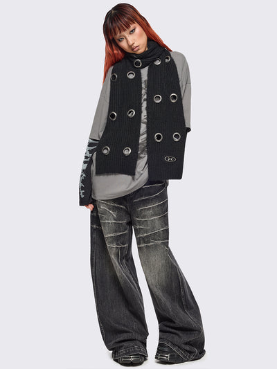 Black knitted scarf with chunky silver eyelets.