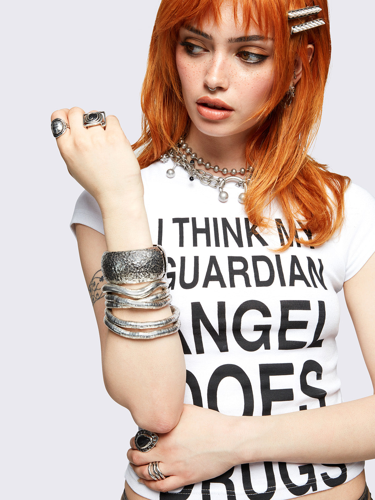 Set of 3 silver bracelets: textured, cuff and moldable snake bracelets.
