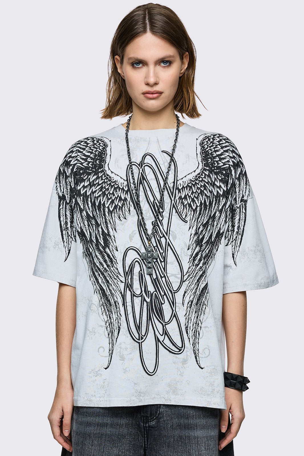 off-white oversized t-shirt with chunky wings graphic front print. 