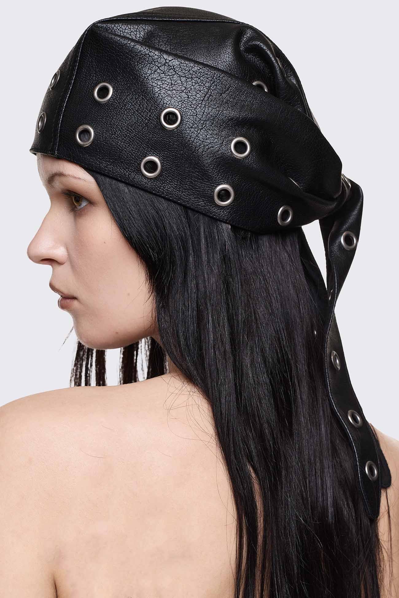 Black faux leather head scarf with antique-silver eyelets and tie detail in a grunge goth style.