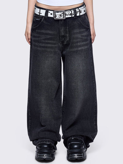 Black washed baggy jeans featuring a "Fallen Angel" winged graphic back print.
